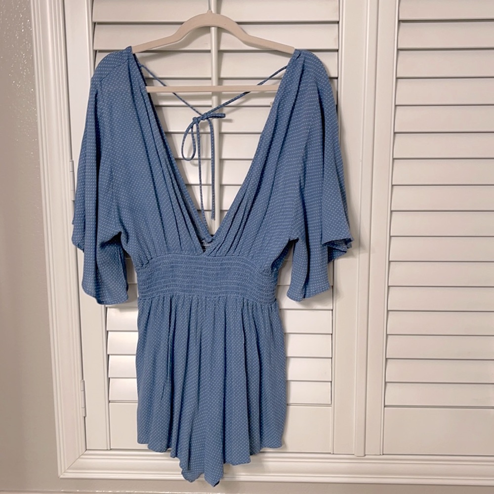 Deep plunge romper.